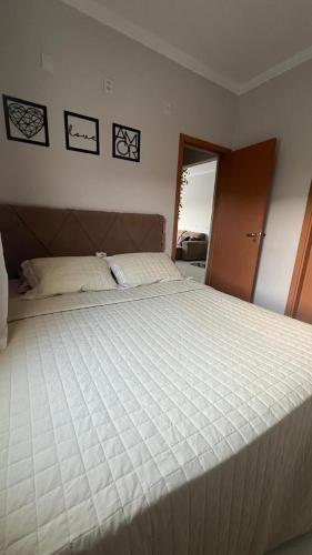 Postel nebo postele na pokoji v ubytování Casa em Penha