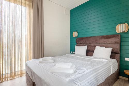 En eller flere senge i et værelse på Holiday Home