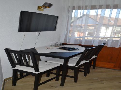 Et tv og/eller underholdning på Gaestehaus Tagescafe Eckenfels