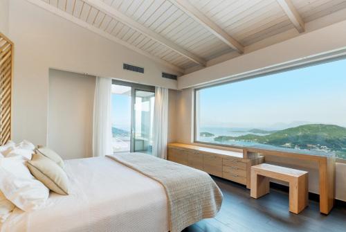 Кровать или кровати в номере Callista