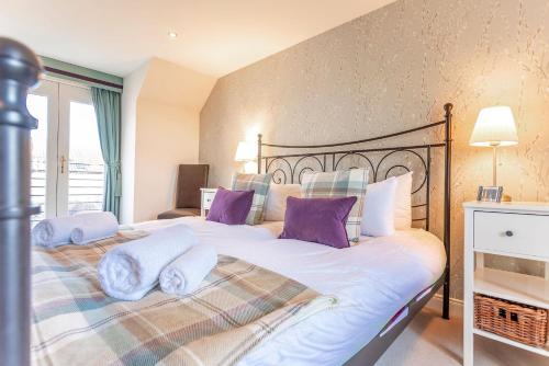 En eller flere senge i et værelse på Swilken Lodge - Blacklaws Steading