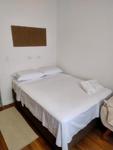 Кровать или кровати в номере Apartamento à 3min do Aeroporto