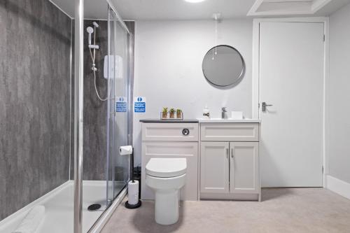 Ванная комната в Leo Apartment - 4 Bedroom Flat in Nairn