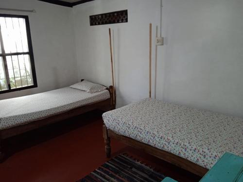 Postel nebo postele na pokoji v ubytování The Blues female only