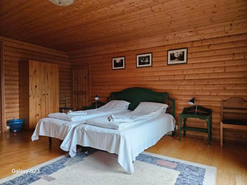 Ένα ή περισσότερα κρεβάτια σε δωμάτιο στο Kaluri Guesthouse