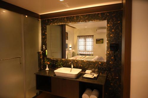 Koupelna v ubytování Nirjhara Coorg