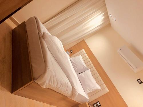 Rúm í herbergi á pYramids iNN