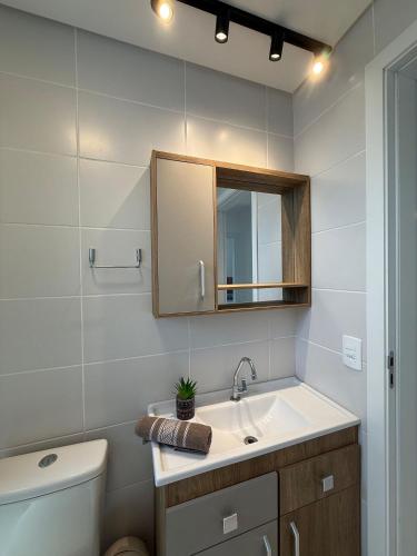 Et badeværelse på Vista Mar • Piscina & Jacuzzi • Cond. Completo