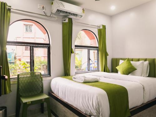 Postel nebo postele na pokoji v ubytování Hotel Raventa