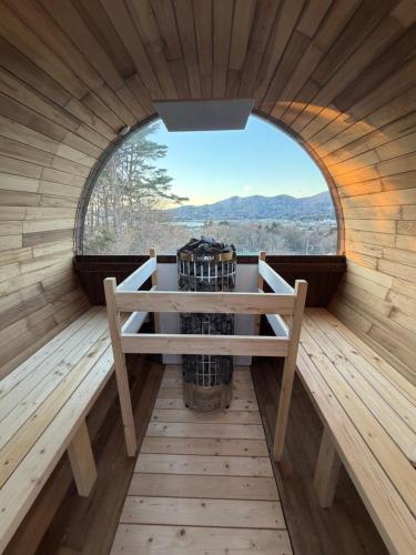 an inside view of a sauna with a window at THE BLISS FUJI - YAMANAKAKO private Sauna Villa with 100m2 Dog Run in Yamanakako
