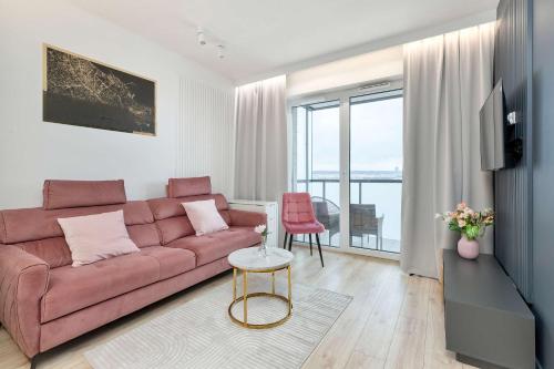 Elegant Apartment with Balcony and Underground Parking by Noclegi Renters