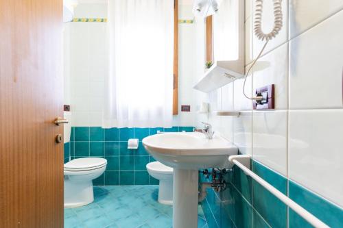 Koupelna v ubytování Olmi Lido Altanea