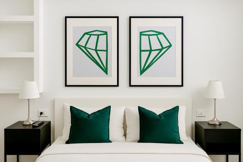 Un pat sau paturi într-o cameră la The Boutique Houses - Hebrew Quarter