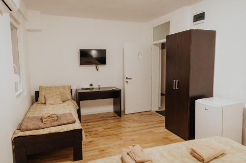 TV a/nebo společenská místnost v ubytování Gallus Inn