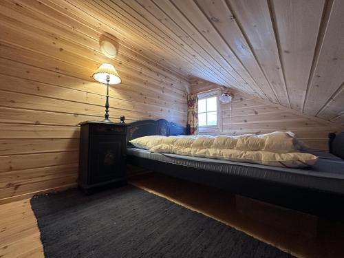 Postel nebo postele na pokoji v ubytování Mountain cabin in Hafjell with sauna - ski in-ski out