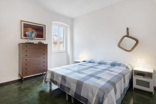 Giường trong phòng chung tại Lerici - Il Terrazzino Di Zia