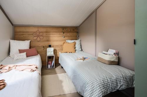 En eller flere senge i et værelse på Le Clos Du Pin