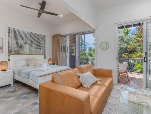 En eller flere senge i et værelse på Dreamtime Dune – Three Bedroom