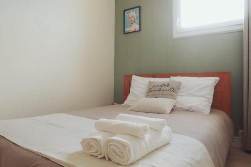 Ένα ή περισσότερα κρεβάτια σε δωμάτιο στο Appartement avec balconnet et vue mer