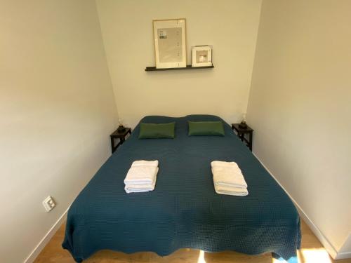 En eller flere senge i et værelse på Cosy apartment 4 in Historic Abbey