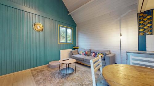 Zona d'estar a Le chalet Normand