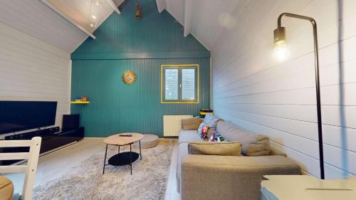 Zona d'estar a Le chalet Normand