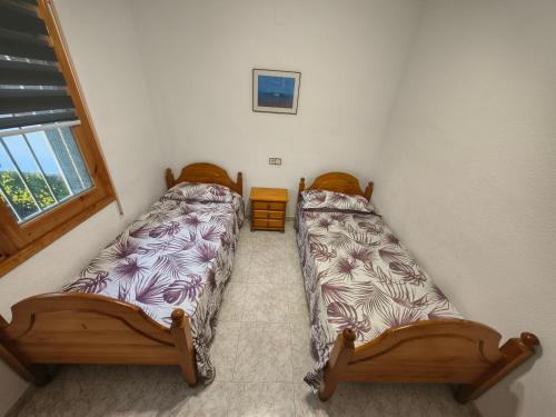 Ένα ή περισσότερα κρεβάτια σε δωμάτιο στο Amarella Costa Dorada