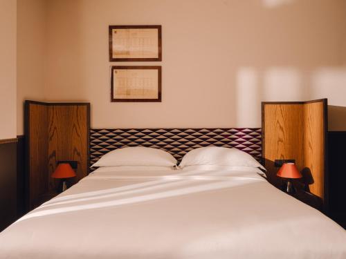 Cama o camas de una habitación en Aethos Milan