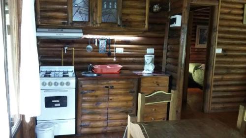 Køkken eller tekøkken på Dielmeral Cabañas