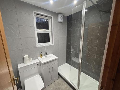 Ένα μπάνιο στο Morenish Mews Kenmore Cottage