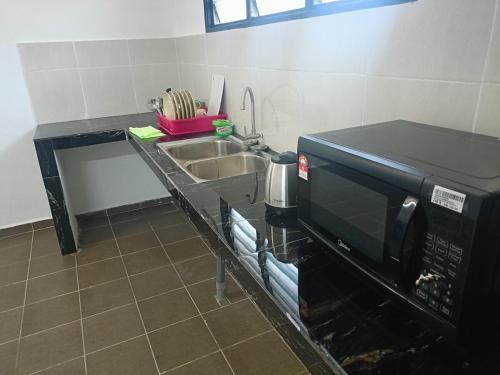 Køkken eller tekøkken på Ipoh budget house