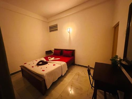 Postel nebo postele na pokoji v ubytování Jaya Villa - Near Airport