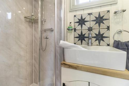 a bathroom with a sink and a shower at 1 Bed in Leintwardine oc-b29785 in Brampton Bryan