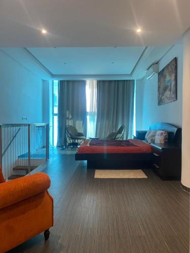 En eller flere senge i et værelse på Loft Duplex les berges du lac