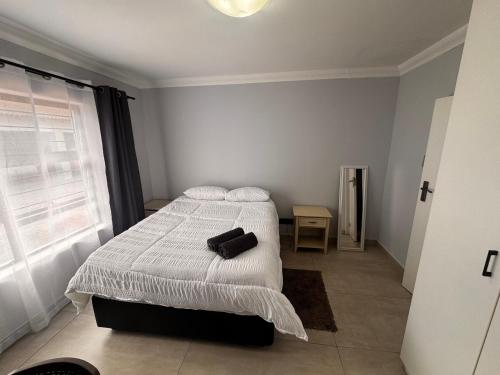 Una cama o camas en una habitación de Da Silva Apartment