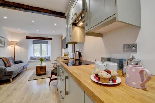 Η κουζίνα ή μικρή κουζίνα στο 2 Bed in Lynmouth oc-foxcot
