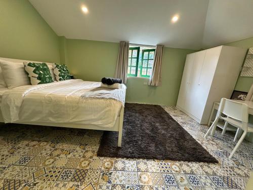 Ένα ή περισσότερα κρεβάτια σε δωμάτιο στο Lime Splash Private pool