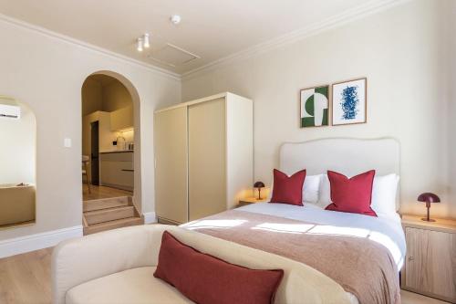 Ένα ή περισσότερα κρεβάτια σε δωμάτιο στο The Exhibition