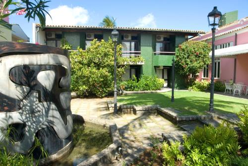 薩爾瓦多的住宿－凱薩琳娜帕拉瓜庫酒店，享有大楼庭院的景色