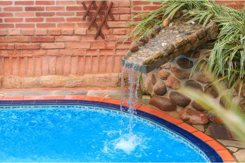 Bazén v ubytování VELINN Pousada Kyrios nebo v jeho okolí