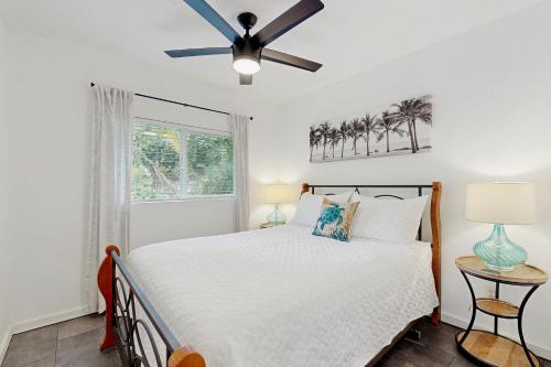 Postel nebo postele na pokoji v ubytování Opakapaka Ohana