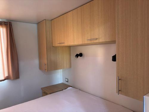 En eller flere senge i et værelse på Refugio del Lobo