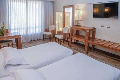 Postel nebo postele na pokoji v ubytování Hotel Alejandro I - Affiliated by Meliá