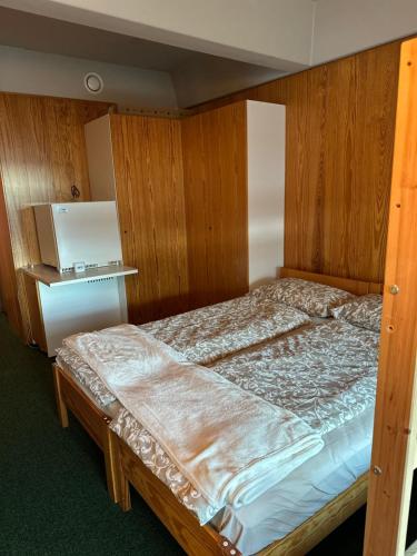 En eller flere senge i et værelse på La Dimora di Pace, adiacente alle piste per 7 persone