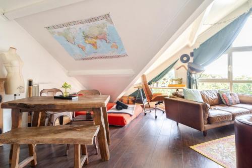 Et opholdsområde på Duplex Plaisir - 25 min du centre de Paris - avec Parking