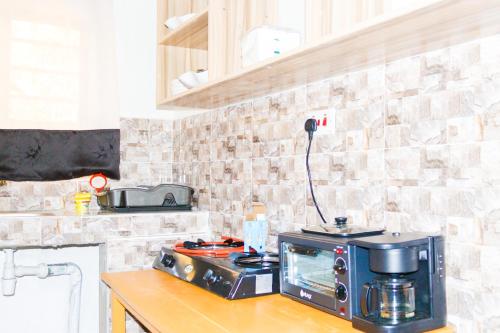 Nhà bếp/bếp nhỏ tại Mutethia Cottages