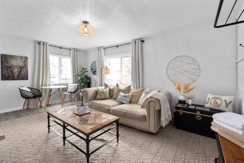 a living room with a couch and a table at Downtown location Near the Beach Dog Friendly in Edmonds
