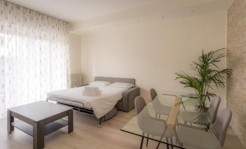 Ένα ή περισσότερα κρεβάτια σε δωμάτιο στο Bergamo Hideout