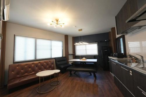 Kuchyň nebo kuchyňský kout v ubytování 碧の宿べっぷ駅前町