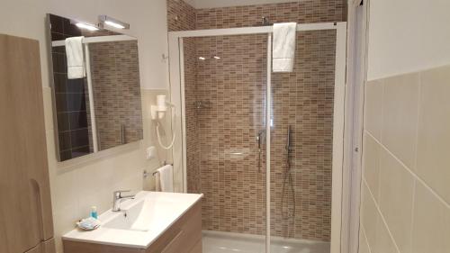 Bilik mandi di Guest House Le Tre Spezie